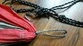 Old cord suspension cut off and new loop threaded through